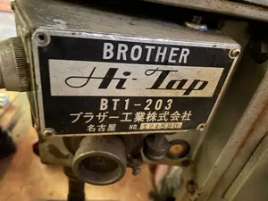 タッピング盤