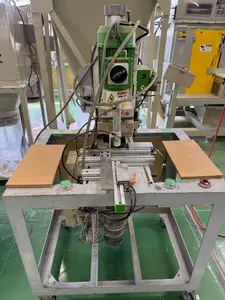 貫通穴上下同時加工機