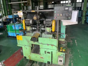 両端加工自動機