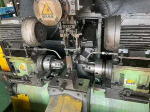 両端加工自動機
