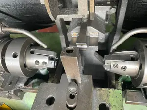 両端加工自動機
