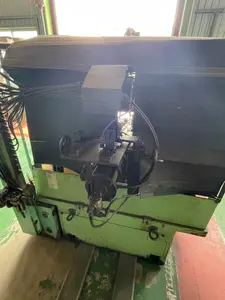両端加工自動機